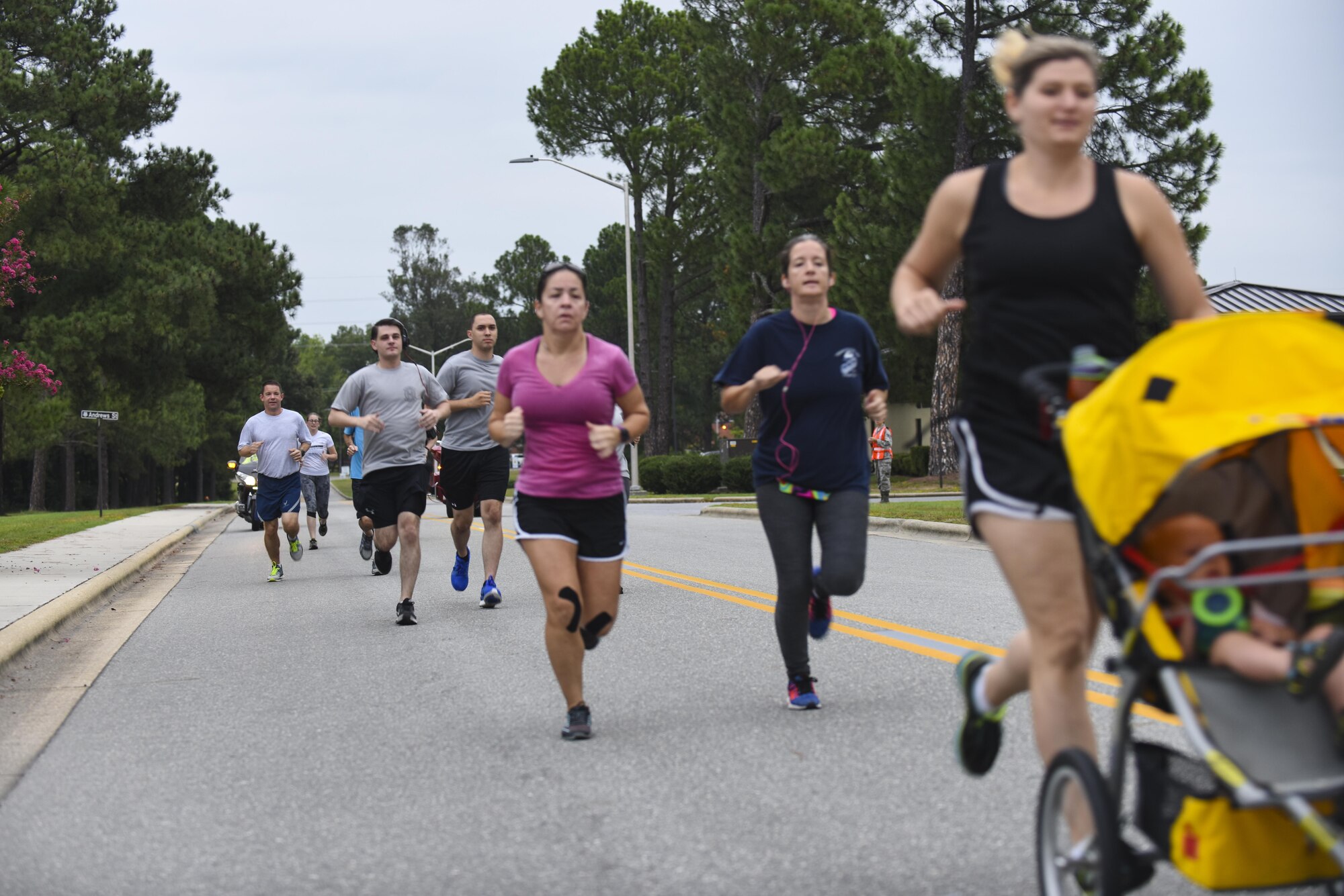 Team Seymour members finish a run to show support for military members who are Prisoners of War/Missing in Action, Sept. 12, 2016, at Seymour Johnson Air Force Base, North Carolina. Each year, Seymour Johnson AFB dedicates a week of events to recognize our nation’s POW/MIAs to include ceremonies and runs. (U.S. Air Force photo by Airman 1st Class Ashley Williamson)