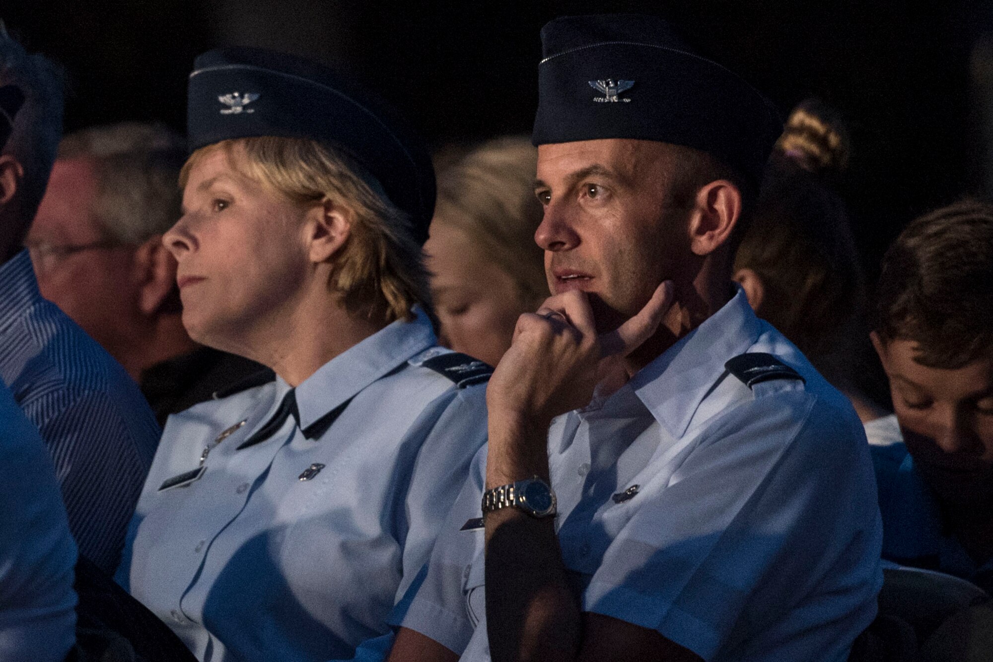 Col. Sharon Bannister, 79th Medical Wing commander, left, and Col. E. John Teichert, 11th Wing and Joint Base Andrews commander, right, watch the U.S. Air Force Band perform during the POW/MIA and Air Force Birthday Event at the Air Force Memorial in Arlington, Va., Sept. 16, 2016. Distinguished visitors, including Gen. David L. Goldfein, Chief of Staff of the Air Force, and Deborah Lee James, Secretary of the Air Force, lined the audience during the event to celebrate the Air Force’s 69th Birthday and honor POW/MIAs.