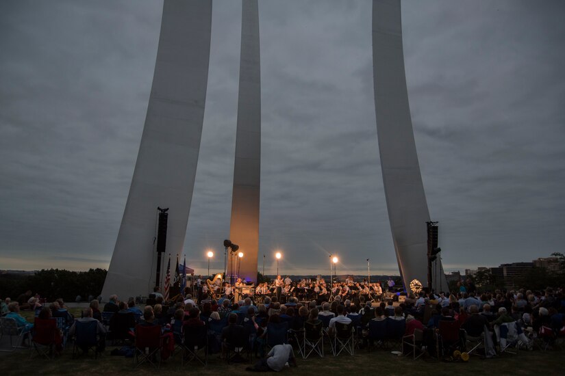 The U.S. Air Force Band performs during the POW/MIA and Air Force Birthday event at the Air Force Memorial in Arlington, Va., Sept. 16, 2016. More than 250 people came out to celebrate the 69th Air Force Birthday and honor military members. The event included multiple band and drill team performances. 