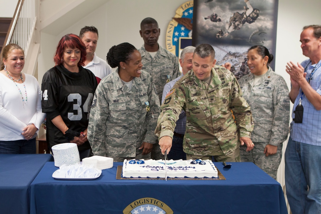 DLA Distribution headquarters employees gathered to celebrate the 69th birthday of the United States Air Force and to recognize two of DLA Distributions air force reserve employees on Sept. 16.