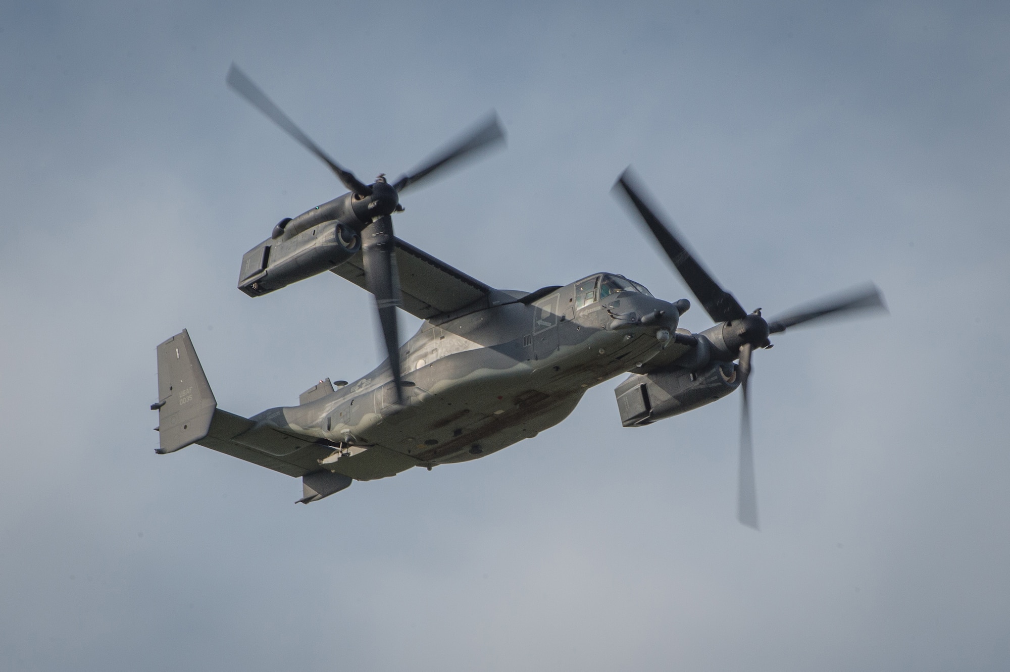 DAYTON, Ohio -- A CV-22 Osprey aircraft assigned to the 20th Special Operations Squadron at Cannon Air Force Base, N.M., provides a fly over for the public before the Green Hornet Dedication ceremony at the National Museum of the United States Air Force, Sept. 15, 2016. The aircraft and crew landed at the museum in tribute to the Green Hornets. (U.S. Air Force photo by Jim Copes)