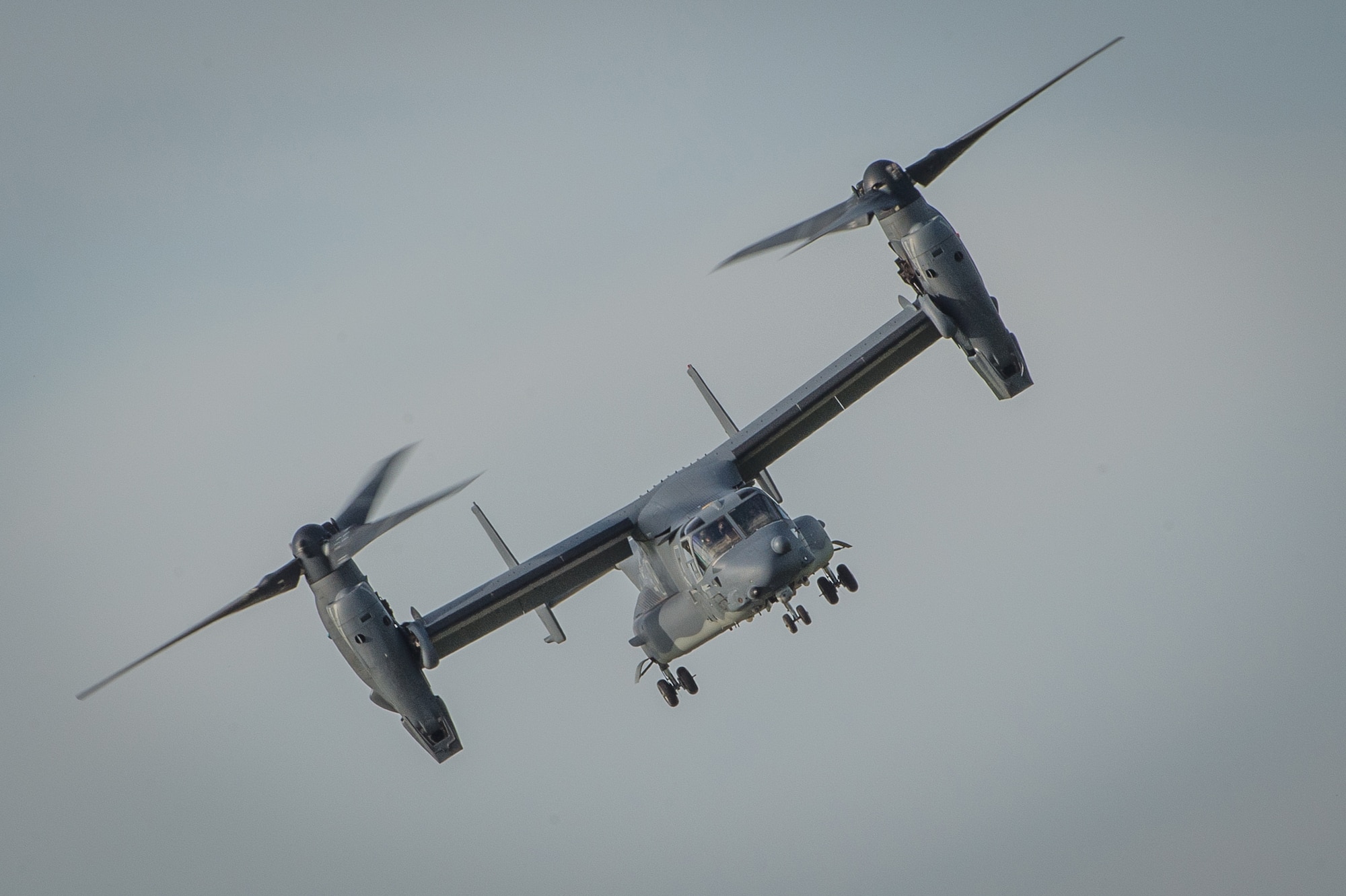 DAYTON, Ohio -- A CV-22 Osprey aircraft assigned to the 20th Special Operations Squadron at Cannon Air Force Base, N.M., provides a fly over for the public before the Green Hornet Dedication ceremony at the National Museum of the United States Air Force, Sept. 15, 2016. The aircraft and crew landed at the museum in tribute to the Green Hornets. (U.S. Air Force photo by Jim Copes)