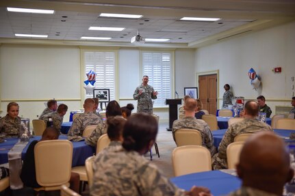 Col. Robert Lyman, Joint Base Charleston commander, shares his Air Force story with members of JB Charleston before a ceremonial cake cutting to celebrate the Air Force’s 69th birthday at the Charleston Club, Sept. 16, 2016. The U.S. Army Air Forces became the Department of the Air Force after the National Security Act of 1947 was signed. W. Stuart Symington, the first Secretary of the Air Force, was sworn into office Sept. 18, 1947. 