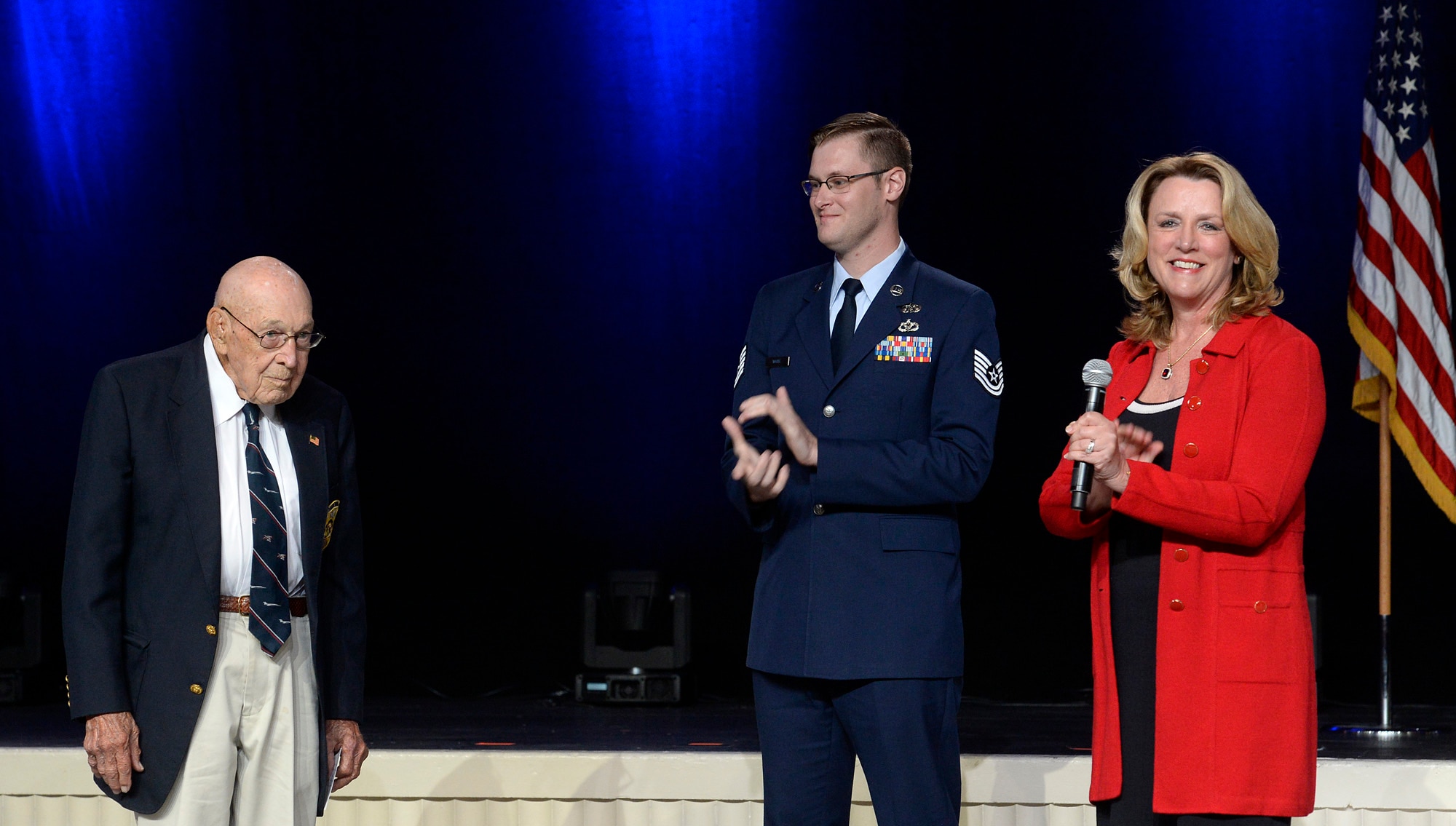 Air Force Secretary Deborah Lee James announces the name of the Air Force's newest bomber, the B-21 Raider, with the help of retired Lt. Col. Richard Cole, one of the Doolittle Raiders, and Tech. Sgt. Derek White, assigned to the Maryland Air National Guard during the Air Force Association's Air, Space and Cyber Conference in National Harbor, Md., Sept. 19, 2016. White was one of the winners of the B-21's naming contest; his entry was inspired by Cole. (U.S. Air Force photo/Scott M. Ash)
