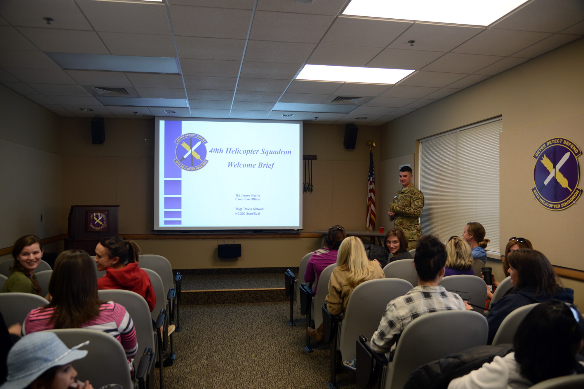 Spouses from 40th Helicopter Squadron receive a pre-flight safety brief from Tech Sgt. Travis Kidwell, 40th HS UH-1N Iroquois flight engineer Sept. 17, 2016, at Malmstrom Air Force Base, Mont. Thirty-one 40th HS spouses flew in the UH-1N in the mountains and over Great Falls. (U.S. Air Force photo/Staff Sgt. Delia Marchick)