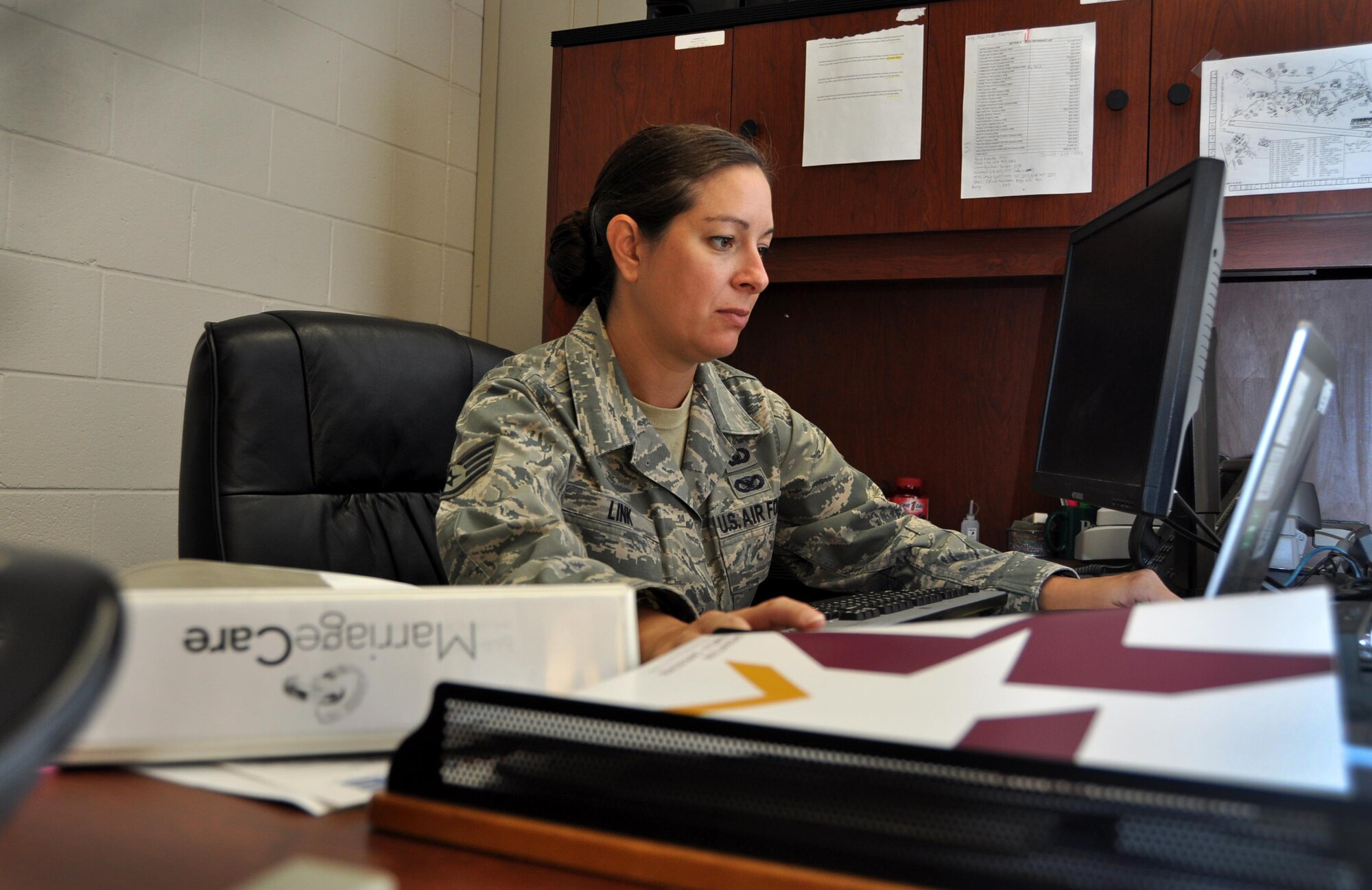 Staff Sgt. Jamie Link, 94th Airlift Wing Chapel Corps chaplain’s assistant, takes her responsibility of religious guidance very seriously at Dobbins Air Reserve Base. She helps meet the diverse spiritual needs of Airmen and their families. (U.S. Air Force photo by Senior Airman Lauren Douglas)