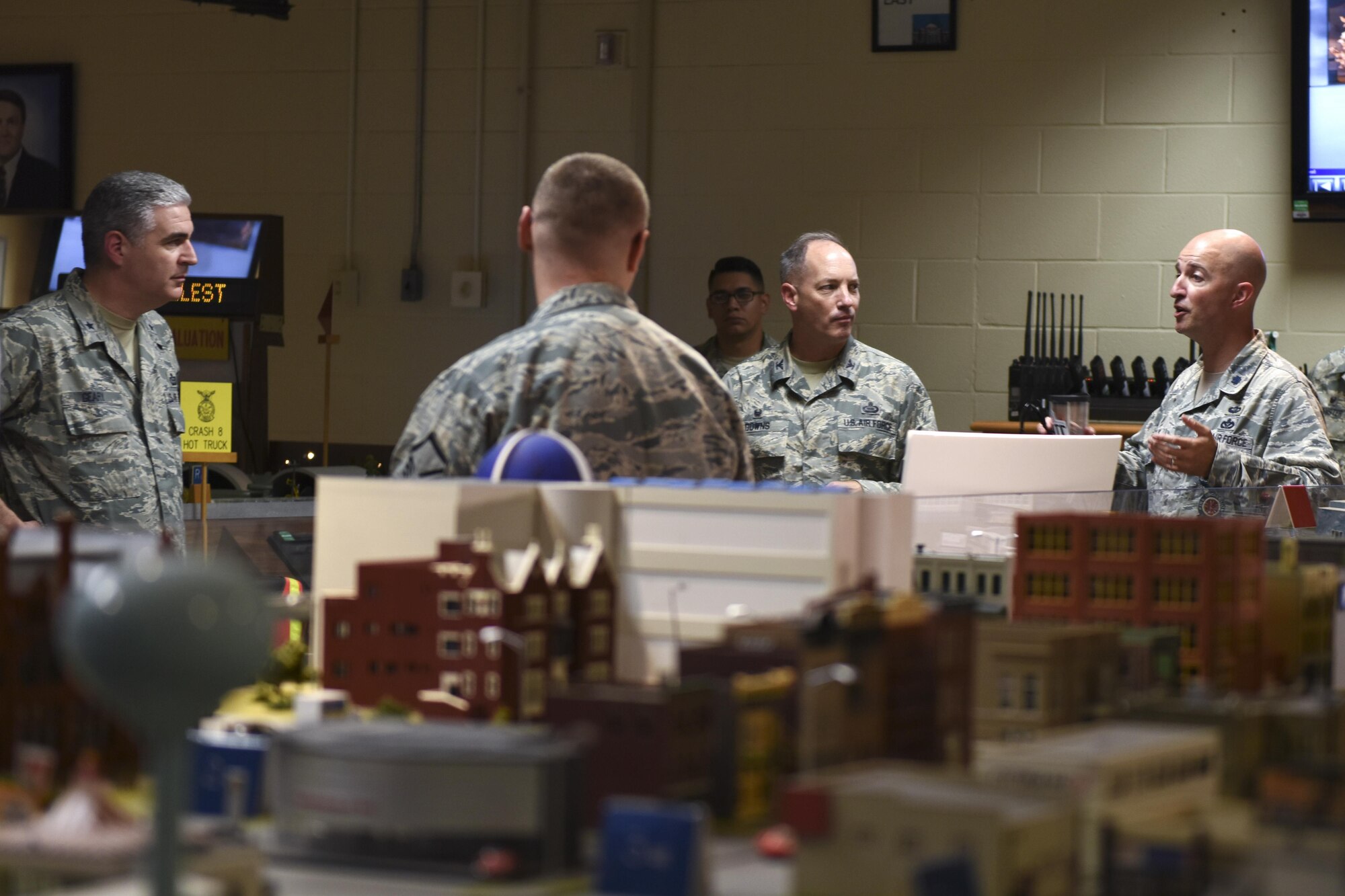 U.S. Air Force Lt. Col. Matthew Welling, 312th Training Squadron Commander, briefs Brig. Gen. Thomas Geary, Intelligence Surveillance and Reconnaissance Strategy Plans Policy and Force Development director, and Col. Michael Downs, 17th Training Wing Commander, at the Louis F. Garland Department of Defense Fire Academy on Goodfellow Air Force Base, Texas, Sept. 15, 2016. Welling briefed the founders about Goodfellow’s fire school training course. (U.S. Air Force photo by Airman 1st Class Chase Sousa/Released)