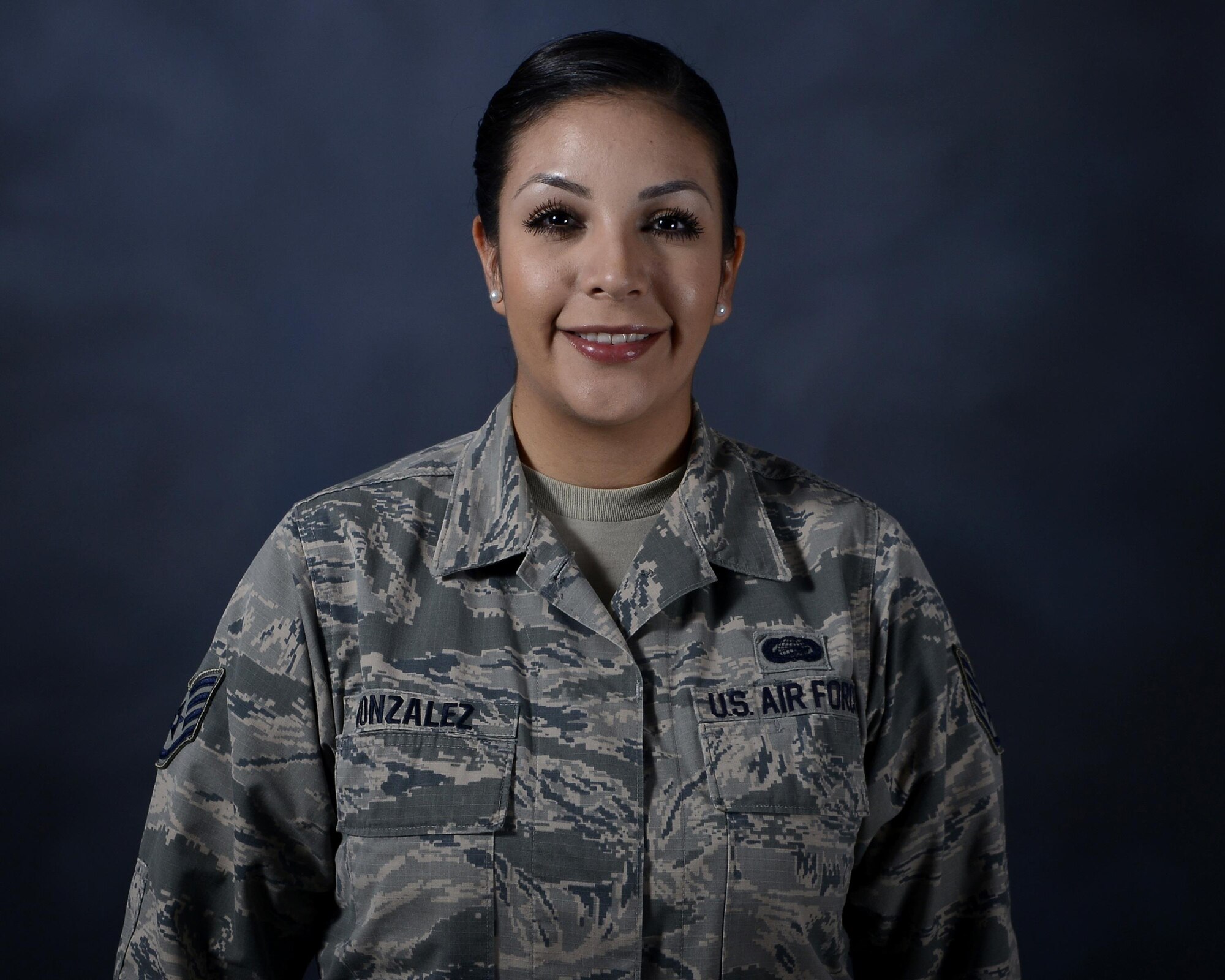Staff Sgt. Kayla Gonzalez, the commander's support staff representative assigned to the 6th Force Support Squadron, pauses for a photo at MacDill Air Force Base, Fla., Sept. 14, 2016. Gonzalez is a part of the Hispanic Heritage Month Committee, and is celebrating her Mexican and Spanish heritage. (U.S. Air Force photo by Airman 1st Mariette Adams)