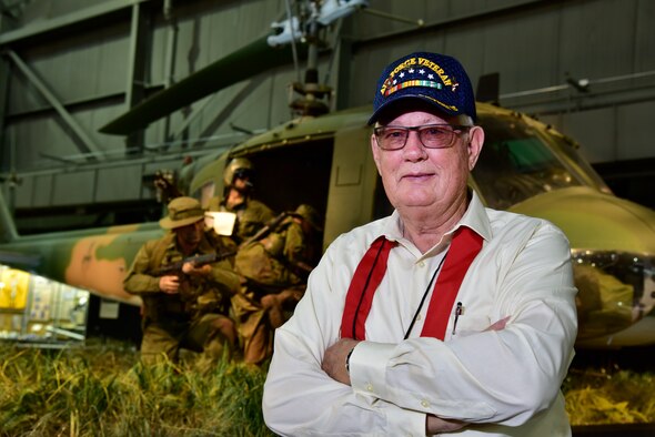 DAYTON, Ohio -- MSgt. (Ret.) Fred Cook stands in front of the Secret War diorama in the Southeast Asia War Gallery at the National Museum of the U.S. Air Force on Sept. 15, 2016. Cook served his second tour in Southeast Asia  with the 20th SOS "Green Hornets" at Nha Trang and Ban Me Thout, Vietnam. He was the right door gunner on the 26 Nov 1968 mission that is depicted in the National Museum of the U.S. Air Force’s UH-1P, 20th SOS “Green Hornets,” legacy diorama display. He was awarded the Distinguished Flying Cross for Valor for his part in this mission.(U.S. Air Force photo by Ken LaRock)
