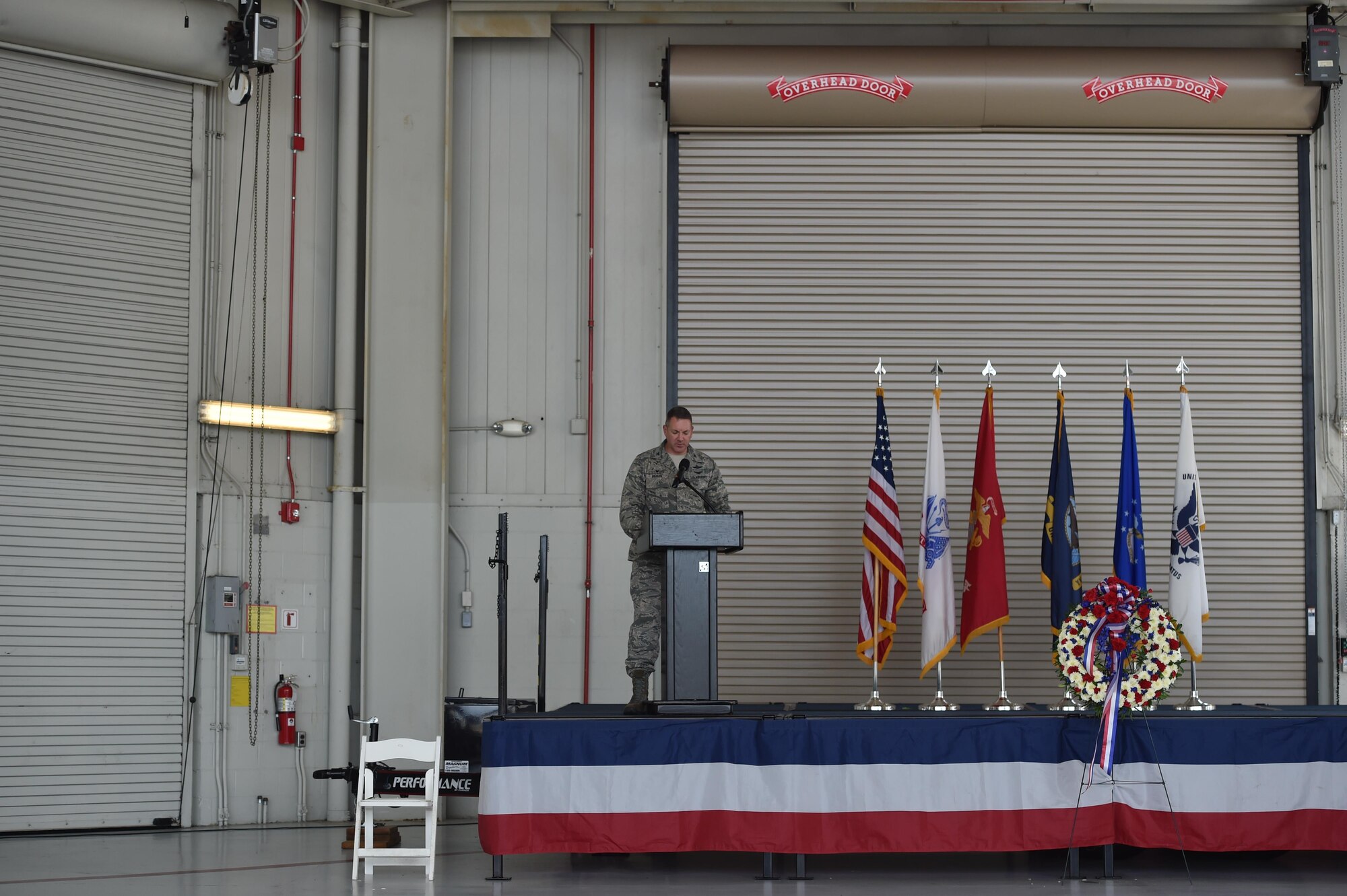 U.S. Air Force Col. Robert Lyman, Joint Base Charleston commander, gives a speech about the importance of remembering prisoners of war and those who are missing in action, at Nose Dock 2, September 16, 2016, at Joint Base Charleston, South Carolina. Every year, members from the base participate in a 24-hour vigil run, a luncheon to honor prisoners of war and those that are missing in action, as well as a formal retreat ceremony. 