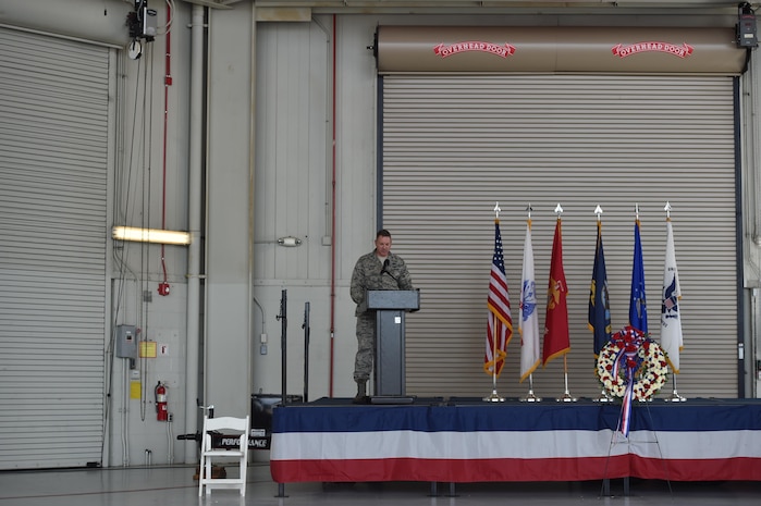 U.S. Air Force Col. Robert Lyman, Joint Base Charleston commander, gives a speech about the importance of remembering prisoners of war and those who are missing in action, at Nose Dock 2, September 16, 2016, at Joint Base Charleston, South Carolina. Every year, members from the base participate in a 24-hour vigil run, a luncheon to honor prisoners of war and those that are missing in action, as well as a formal retreat ceremony. 