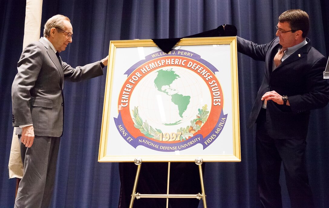 Former Defense Secretary William J. Perry, left, and then-Deputy Defense Secretary Ash Carter, unveil the William J. Perry Center for Hemispheric Defense Studies during a renaming ceremony April 2, 2013, at Fort Lesley J. McNair, Washington. Carter and Perry discussed defense innovation at the Hoover Institution, Sept. 19, 2016. Defense Department photo by Rachel Larue