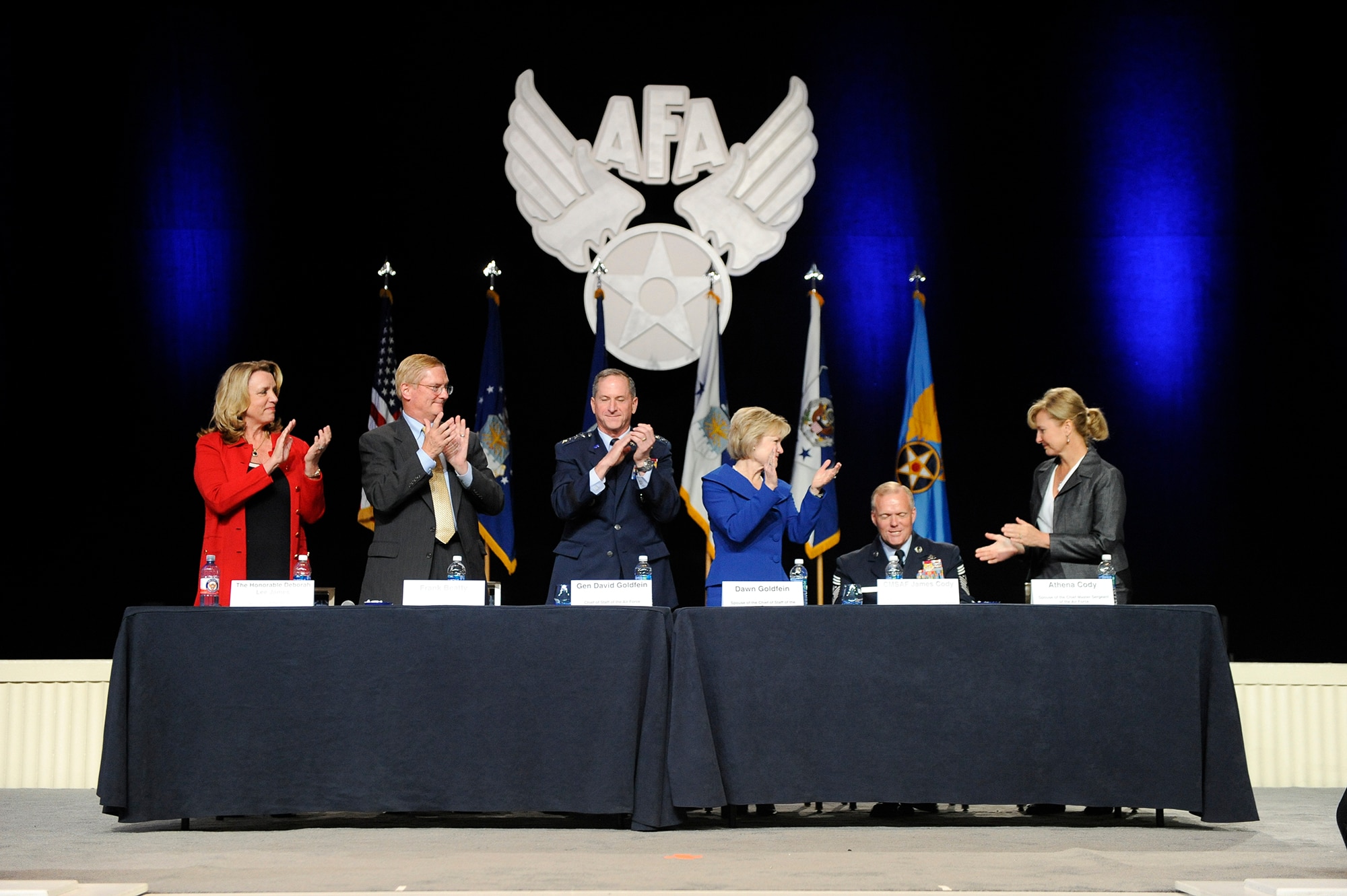 Senior leadership and spouses congratulate Chief Master Sgt. of the Air Force James A. Cody for his service during a town hall session at the Air Force Association's Air, Space and Cyber Conference in National Harbor, Md., Sept. 19, 2016. (U.S. Air Force photo/Andy Morataya)             