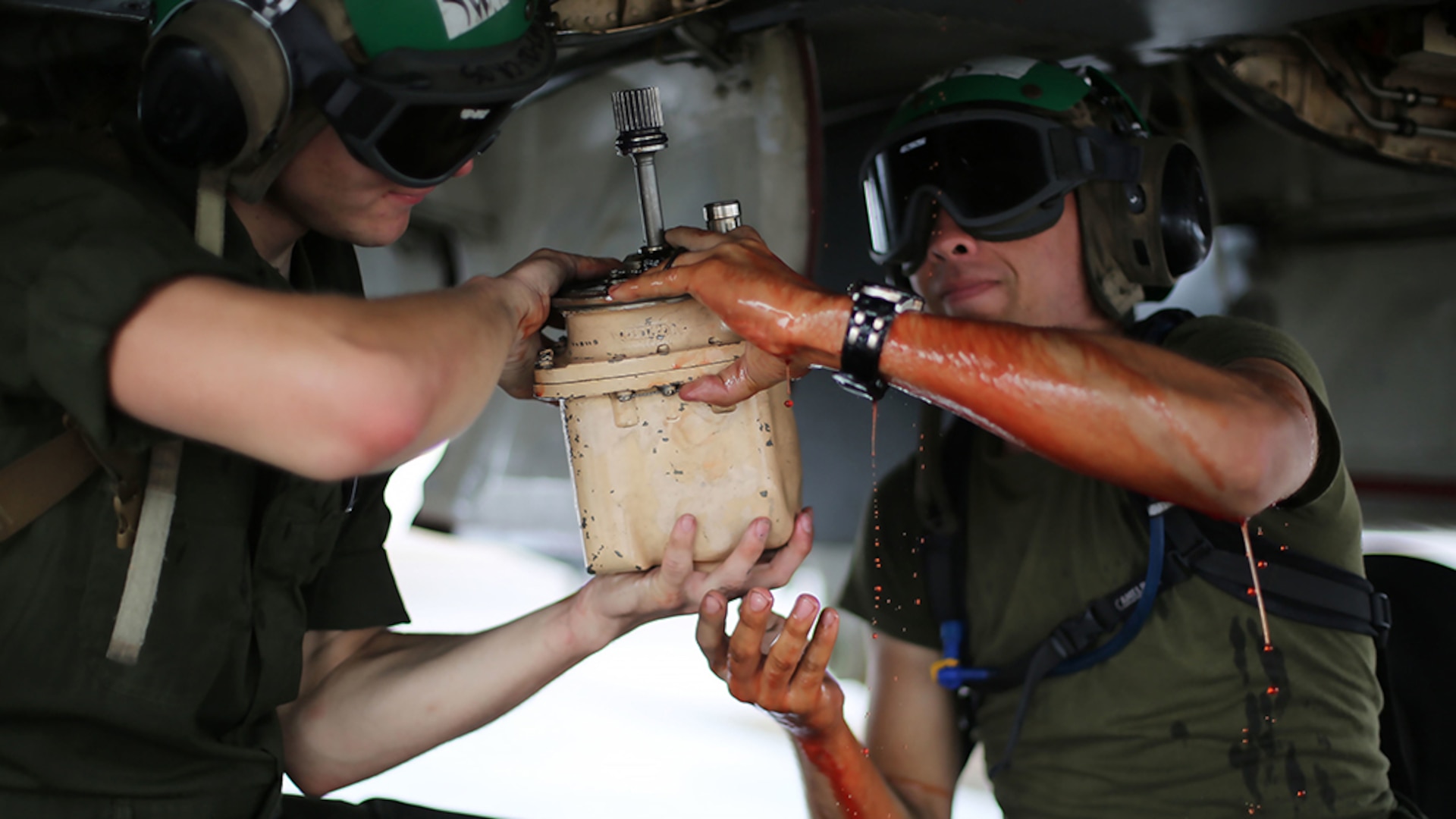 Airframes mechanics assigned to Marine All Weather Fighter Attack Squadron (VMFA(AW)) 242 remove a hydraulic pump from an F/A-18D Hornet after a flight mission during Exercise Valiant Shield 16 at Andersen Air Force Base, Guam, Sept. 18, 2016. Powerliners, airframes mechanics, communication navigation, and ordnance technicians, work around the clock to ensure flight schedules are met for aviation operations during the exercise. During this U.S.-only, biennial field training exercise, F/A-18D Hornets flew in a plethora of missions that emphasize joint integration, interoperability and expeditionary readiness. 