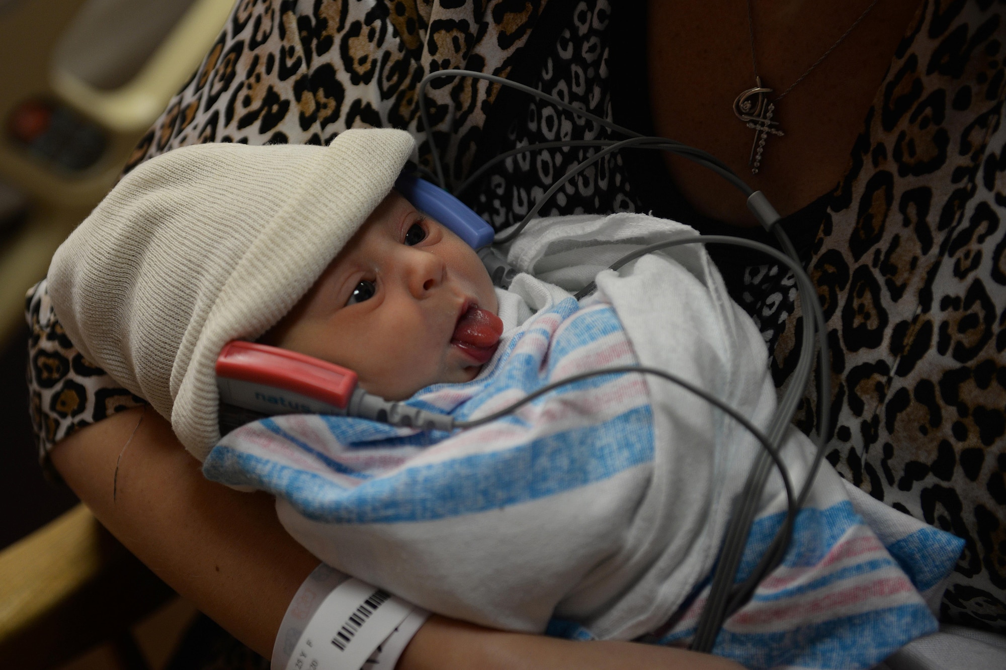 Mackenzie Beihl, daughter of Airman 1st Class Travis Beihl, 81st Training Wing Public Affairs photojournalist, gets her hearing tested in the mother/baby suite at Memorial Hospital in Gulfport, Miss. Aug. 22, 2016.  Mackenzie was born at 10:29 a.m. with a weight of 6 pounds, 5 ounces and measured 17 and 3/4 inches long.. (U.S. Air Force photo by Airman 1st Class Travis Beihl/Released)