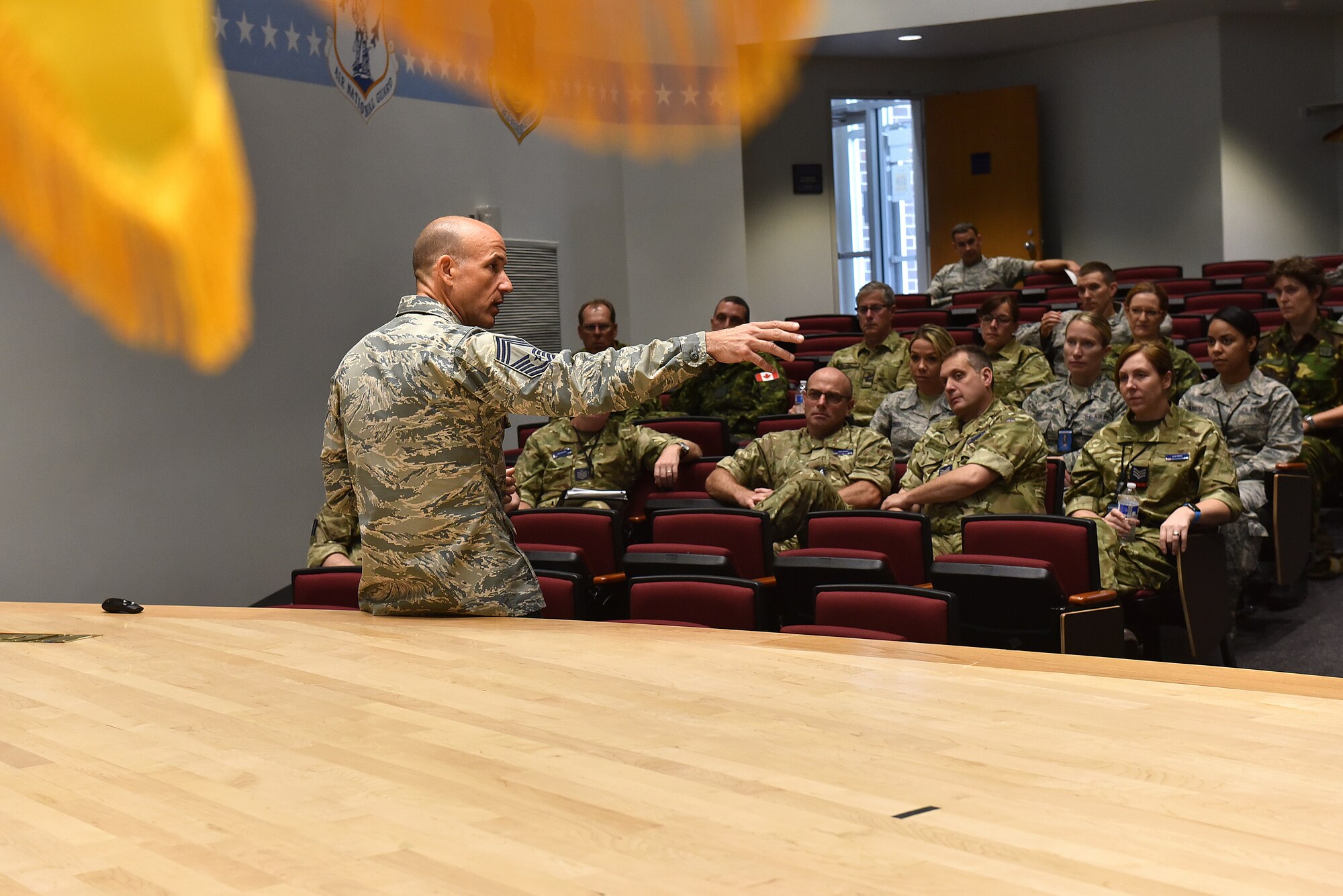 Chief Master Sgt. Edward Walden Sr., assigned to the I.G. Brown Training and Education Center, talks about the U.S. Air National Guard, Sept. 19, 2016, during the International Noncommissioned Officer Enlisted Leadership Development Seminar at McGhee Tyson Air National Guard Base in Louisville, Tenn. This year's INLEAD includes 39 NCOs from the United States, United Kingdom, Canada, Germany, Netherlands and Switzerland. (U.S. Air National Guard photo by Master Sgt. Mike R. Smith)