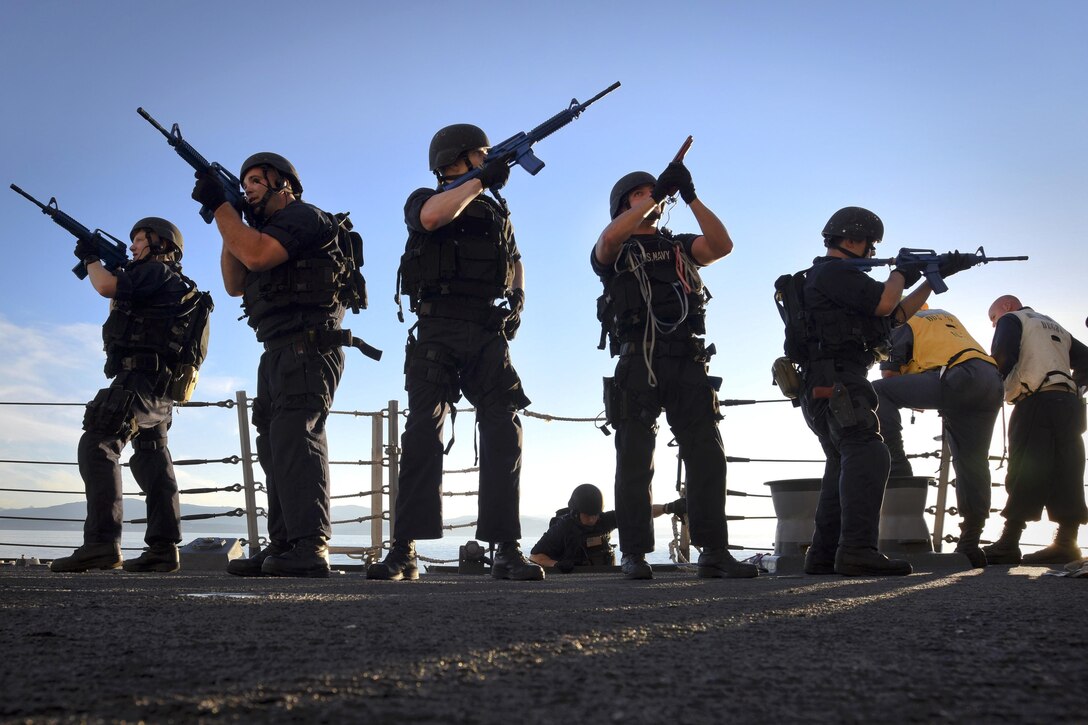 Sailors participate in a visit, board, search and seizure drill on the guided-missile destroyer USS Shoup in the Strait of Georgia, Sept. 14, 2016. The Shoup is conducting routine training exercises. Navy photo by Petty Officer 2nd Class Holly L. Herline