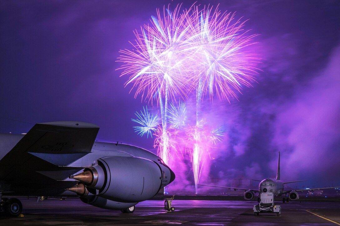 Fireworks explode over KC-135 Stratotanker at the 2016 Japanese-American Friendship Festival at Yokota Air Base, Japan, Sept. 18, 2016. Tens of thousands of people attend the annual festival to learn more about the U.S. military and American culture. Air Force photo by Senior Airman Delano Scott