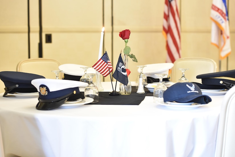 Service hats represent each branch of service on the POW/MIA table. Every year, members from Joint Base Charleston participate in a 24-hour vigil run, a luncheon to honor prisoners of war and those that are missing in action, as well as a formal retreat ceremony. 