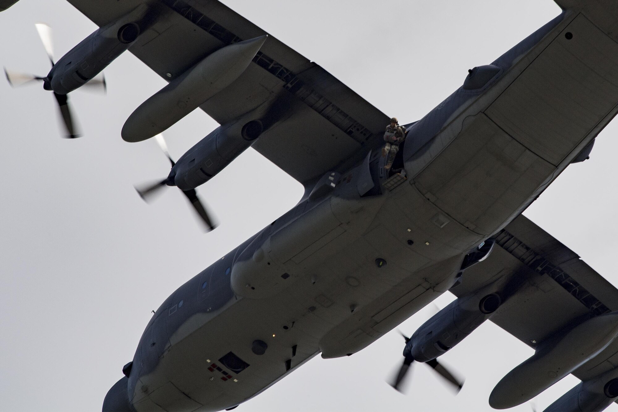 A U.S. Air Force Airman from the 823d Base Defense Squadron exits an MC-130H Combat Talon II during a static-line jump, Sept. 16, 2016, at the Lee Fulp drop zone in Tifton, Ga. Members of the 823d BDS jump often to maintain proficiencies. (U.S. Air Force photo by Airman Daniel Snider)