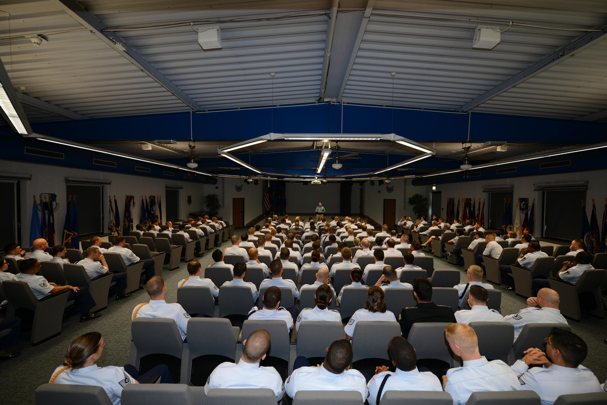 Kisling NCO Academy students gather to listen to retired Air Force Lt. Col. Melvin Pollack, Vietnam War veteran and former prisoner of war, share his experience of spending five years and eight months at a North Vietnamese prison camp, September 12, 2016, Kapaun Air Station, Germany. Pollack encouraged the students to adhere to the Code of Conduct even if faced with brutal treatment. (U.S. Air Force photo/ Airman 1st Class Joshua Magbanua)