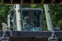 U.S. Army Staff Sgt. Keshawn Wade, 56th Transportation Battalion 567th Inland Transportation Company cargo specialist, trains U.S. Army Spc. Khiry Raspberry, 56th Transportation Battalion 567th ICTC cargo specialist, on a Kalmar Forklift at Joint Base Langley-Eustis, Va., Sept. 8, 2016. Cargo specialists learn the operations and care of forklifts, power winches, container handlers and cranes along with techniques for loading and storing cargo. (U.S. Air Force photo by Airman 1st Class Derek Seifert)