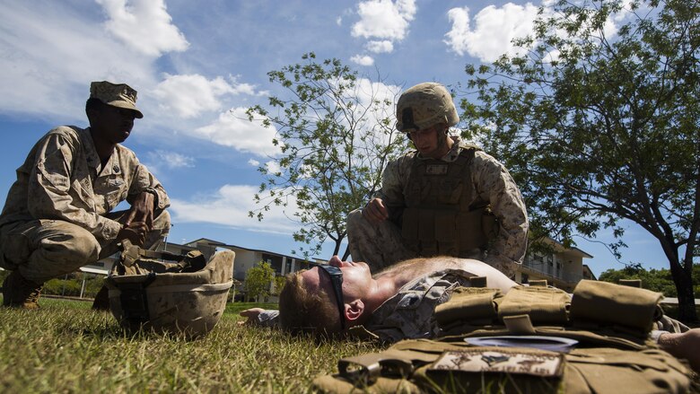 U.S. Marines with 1st Battalion, 1st Marine Regiment, practice treating a simulated casualty during a combat lifesaving course for the Frontline Leaders Course at Robertson Barracks, Australia, Sept. 6, 2016. The Frontline Leaders Course is designed to give U.S. Marines and Australian soldiers an opportunity to learn and improve their leadership skills and tactics during the Marine Rotational Force – Darwin.
