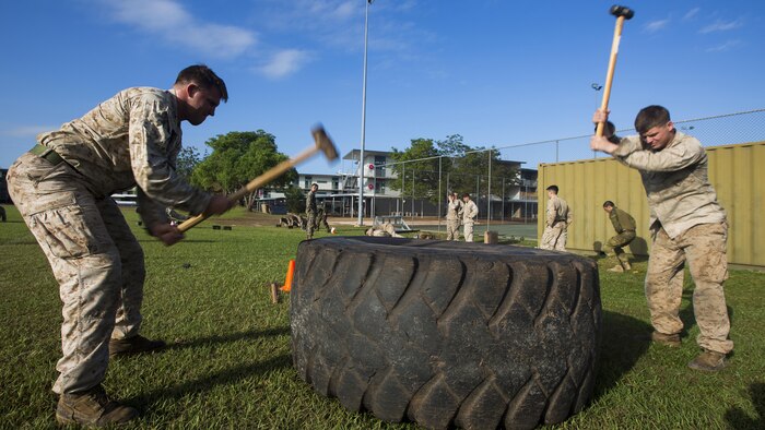 U.S. Marines with 1st Battalion, 1st Marine Regiment, Marine Rotational Force - Darwin, and Australian soldiers with 5th Battalion, Royal Australian Regiment, grapple during the Frontline Leaders Course at Robertson Barracks, Northern Territory, Australia, Sept. 9, 2016. The course is intended to be an addition to the Marine Corps Lance Corporal’s Seminar, Corporal's Course, and Sergeant's Course. The course instills knowledge and leadership skills to positively impact those under their charge and the future of the Marine Corps. 1st Battalion, 1st Marine Regiment, created the course and this will be the first time the course has been officially conducted.