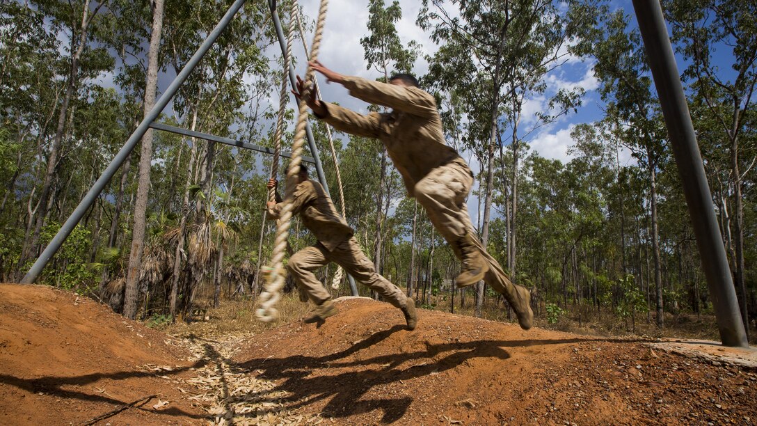 U.S. Marines with 1st Battalion, 1st Marine Regiment, Marine Rotational Force - Darwin, and Australian soldiers with 5th Battalion, Royal Australian Regiment, overcome various obstacles during the Frontline Leaders Course at Robertson Barracks, Northern Territory, Australia, Sept. 9, 2016. The course is intended to be an addition to the Marine Corps Lance Corporal’s Seminar, Corporal's Course, and Sergeant's Course. The course instills knowledge and leadership skills to positively impact those under their charge and the future of the Marine Corps. 1st Battalion, 1st Marine Regiment, created the course and this will be the first time the course has been officially conducted.