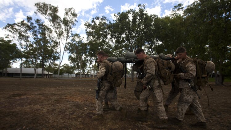 U.S. Marines with 1st Battalion, 1st Marine Regiment, Marine Rotational Force - Darwin, and Australian soldiers with 5th Battalion, Royal Australian Regiment, conduct a casualty evacuation drill during the Frontline Leaders Course at Robertson Barracks, Northern Territory, Australia, Sept. 10, 2016. The course is intended to be an addition to the Marine Corps Lance Corporal’s Seminar, Corporal's Course, and Sergeant's Course. The course instills knowledge and leadership skills to positively impact those under their charge and the future of the Marine Corps. 1st Battalion, 1st Marine Regiment, created the course and this will be the first time the course has been officially conducted.