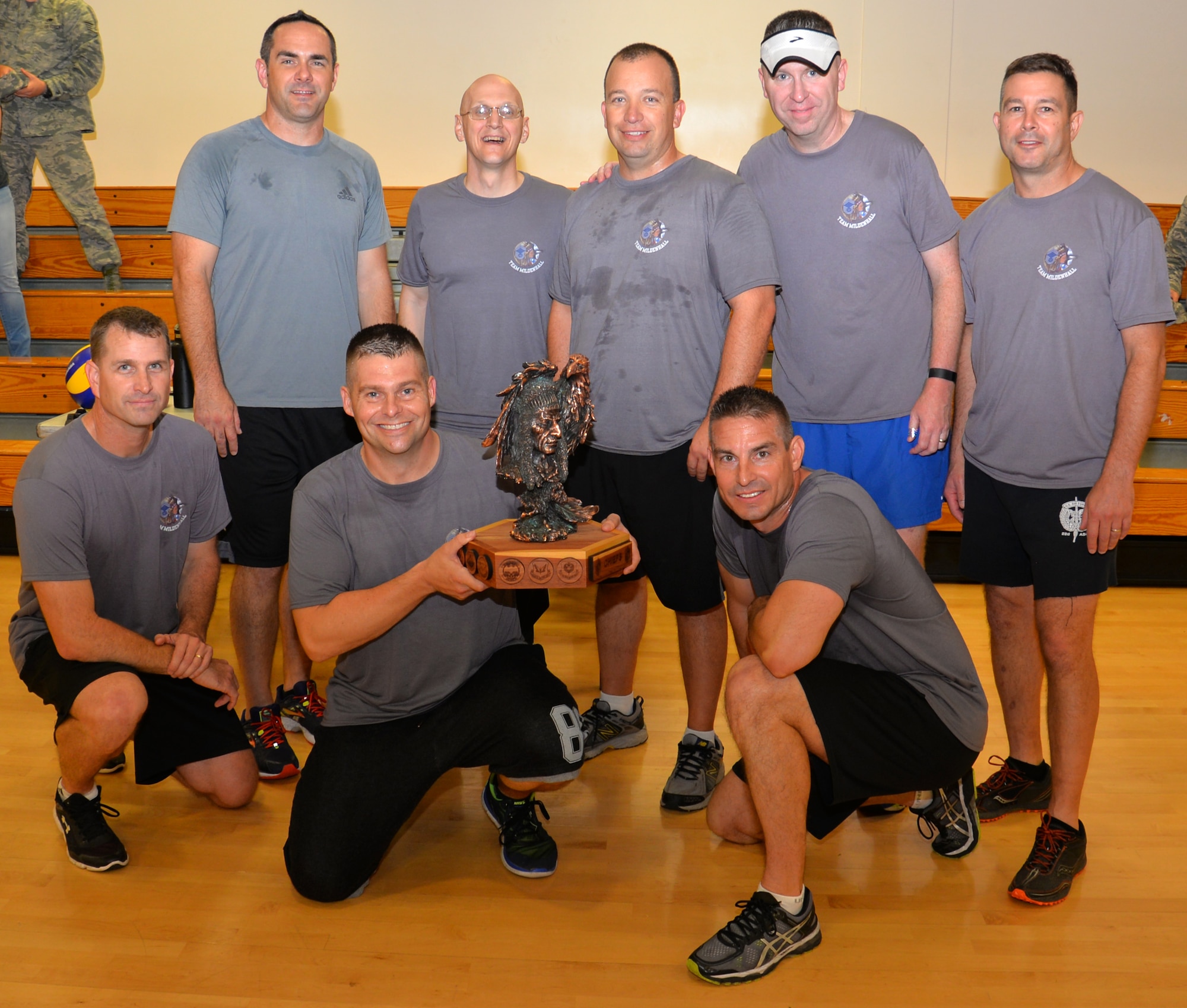 Team Mildenhall chief master sergeants pose for a photograph following the “Chiefs vs. Eagles” volleyball game Sept. 16, 2016, on RAF Mildenhall, England. Team Mildenhall leaders take part in this quarterly event to build comradery amongst the chief master sergeants and the colonels. (U.S. Air Force photo by Gina Randall)
