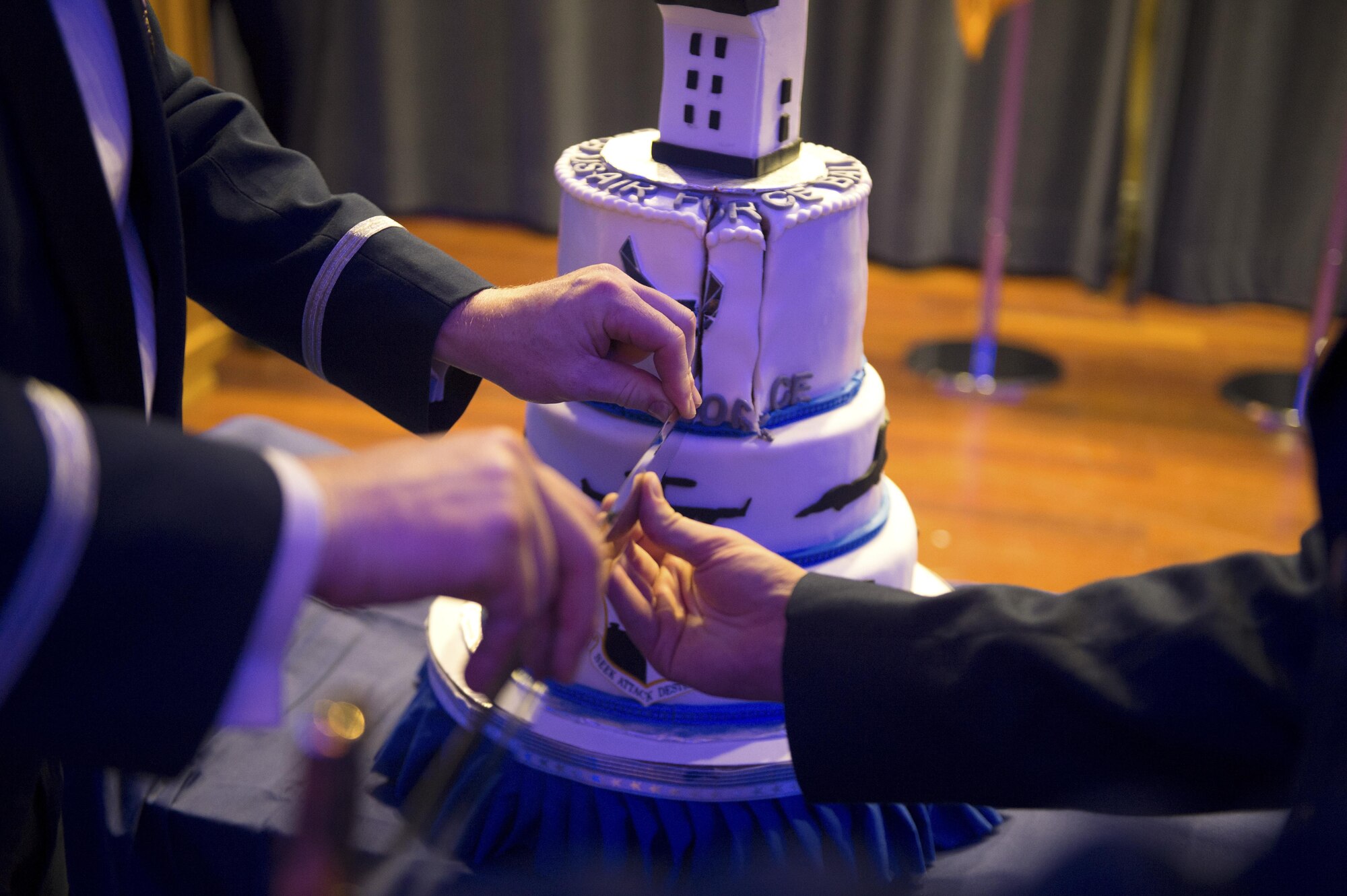 U.S. Air Force Col. Joseph McFall, 52nd Fighter Wing commander, and Airman 1st Class John Becker, 52nd Logistics Readiness Squadron storage and issue technician, cut the cake during the Air Force Ball at Club Eifel on Spangdahlem Air Base, Germany, Sept. 17, 2016, in honor of the Air Force's birthday. The event celebrated 69 years the Air Force has operated as an independent military branch since separating form the Army, Sept. 18, 1947. (U.S. Air Force photo by Airman 1st Class Preston Cherry/Released)