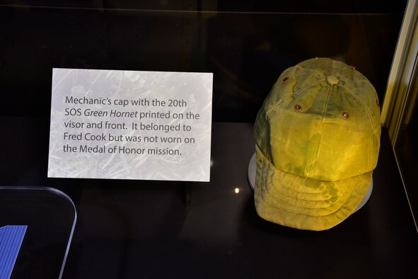 DAYTON, Ohio -- Mechanic’s cap with the 20th SOS Green Hornet printed on the visor and front.  It belonged to SSgt. Fred Cook but was not worn on the Medal of Honor mission.  These items are on display in the Southeast Asia War Gallery at the National Museum of the United States Air Force. (U.S. Air Force photo by Ken LaRock)
