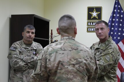 Command Sgt. Major William F. Thetford, command senior enlisted leader of the U.S. Central Command, visited Soldiers at Camp Arifjan, Kuwait, and received a briefing on the current state of sustainment and logistical operations from Maj. Gen. Paul Hurley, commanding general of the 1st Theater Sustainment Command, Sept. 14, 2016.