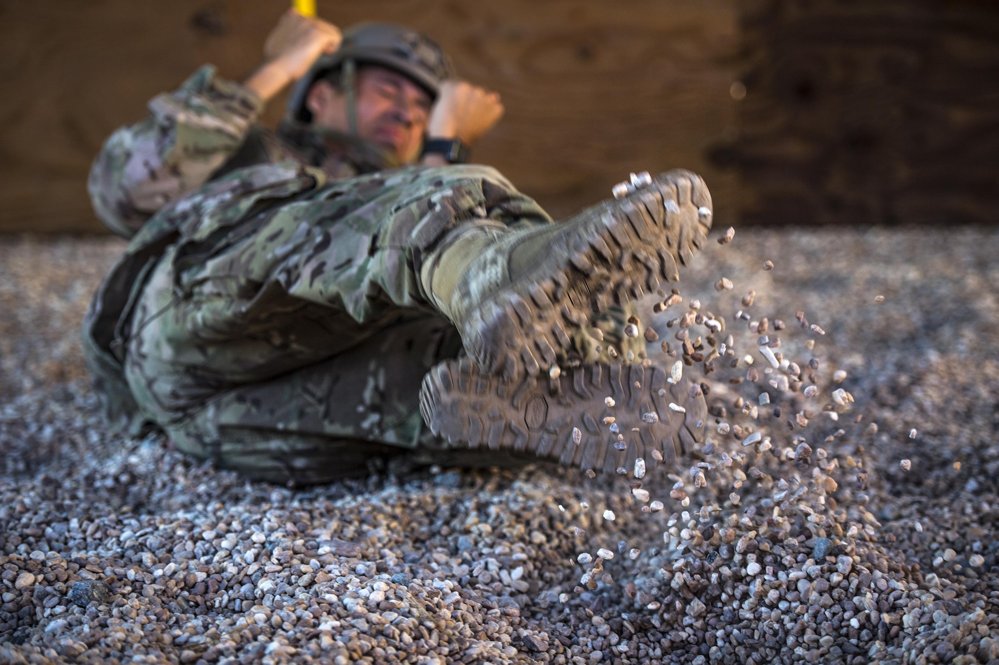 U.S. Air Force Staff Sgt. Charles Valcarcel, 823d Base Defense Squadron, practices landing a static-line jump, Sept. 16, 2016, at Moody Air Force Base, Ga. Prior to conducting a real-world jump, Airmen practice their techniques and procedures to ensure readiness. (U.S. Air Force photo by Staff Sgt. Ryan Callaghan)