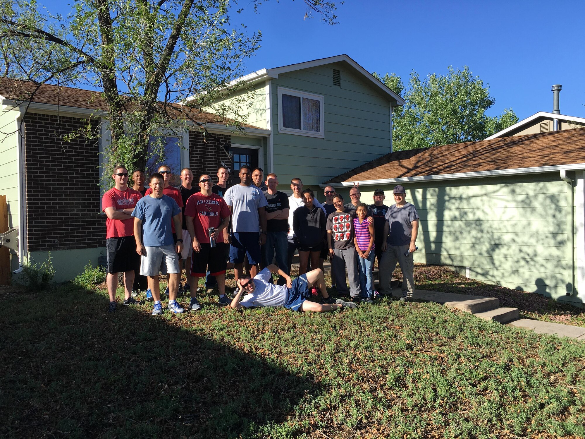 COLORADO SPRINGS, Colo. – Members of the 4th Space Control Squadron from Peterson Air Force Base, Colorado, gathered to prepare the home of Staff Sgt. Ryan Meston, 4th SPCS space system operator, before he returned from experimental cancer treatment in Seattle. Meston battled testicular cancer and leukemia back-to-back and is now in remission for both. (Courtesy photo)