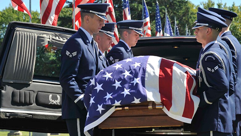 Members of McConnell Air Force Base’s honor guard move the casket of Maj. Dean Klenda, an F-105 Thunderchief pilot who was listed as missing in action during the Vietnam War, at his funeral, Sept. 17, 2016, at St. John Nepomucene Church in Pilsen, Kan. Klenda was laid to rest exactly 51 years after his aircraft went down in 1965 in North Vietnam. His remains were located and verified by the Defense POW/MIA Accounting Agency. (U.S. Air Force photo/Airman Erin McClellan)