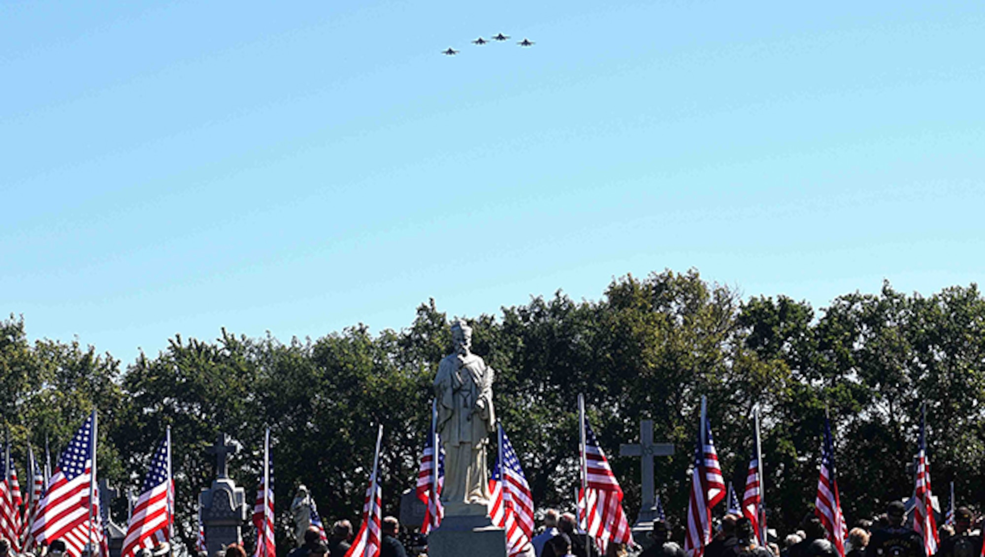 Four F-16 Fighting Falcons fly in a missing man formation over the funeral of Maj. Dean Klenda, an F-105 Thunderchief pilot who was listed as missing in action during the Vietnam War, Sept. 17, 2016, at St. John Nepomucene Church in Pilsen, Kan. Klenda was laid to rest exactly 51 years after his aircraft went down in 1965 in North Vietnam. His remains were located and verified by the Defense POW/MIA Accounting Agency. (U.S. Air Force photo/Airman Erin McClellan)