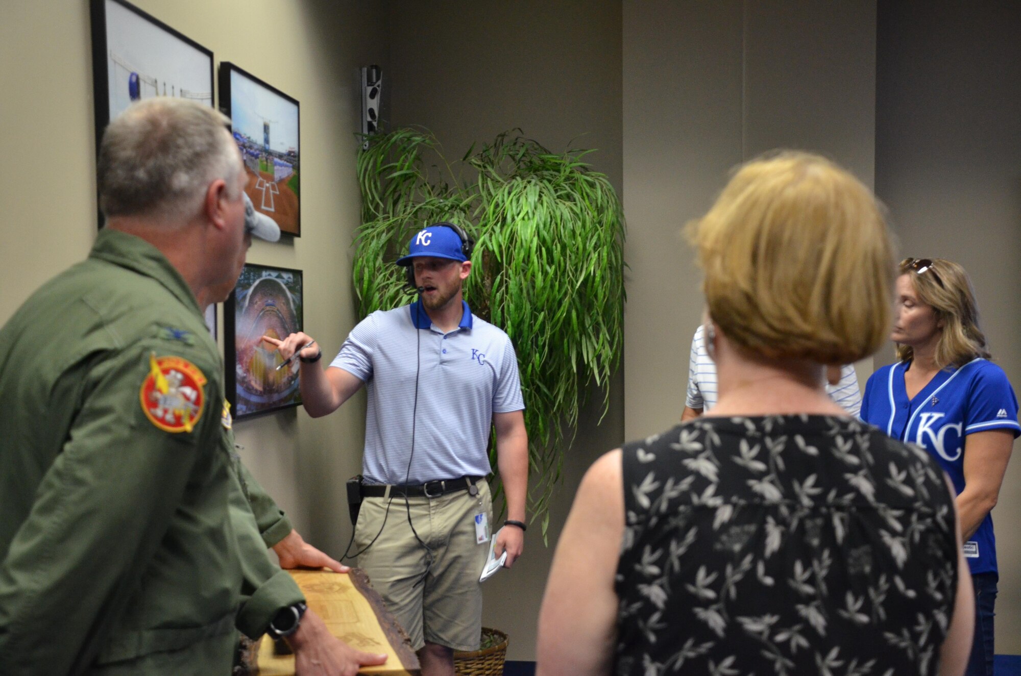 A Kauffman Stadium staff member briefs military representatives, including U.S. Air Force Col. Gregory Eckfeld, 442nd Fighter Wing vice commander, and Lt. Col. Lee Saugstad, 303rd Fighter Squadron pilot, before a Royals game in Kansas City, Mo., Sept. 19, 2016. Royals Charities, created in 2001, is the charitable foundation of the Kansas City Royals that provides military members and their families financial support. Local organizations were invited to the game so they could be presented a $350,000 check. (U.S. Air Force photo/Senior Airman Missy Sterling)