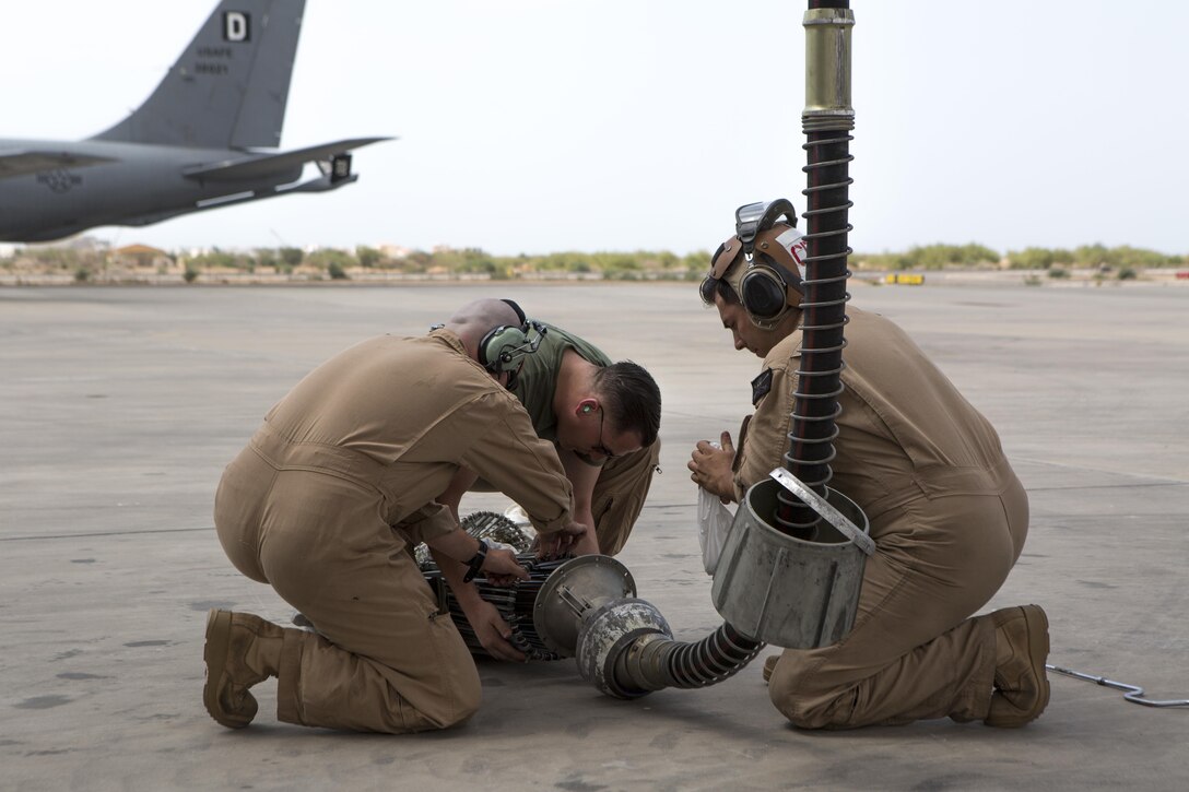 A flight crew with Marine Aerial Refueler Transport Squadron-352, Special Purpose Marine Air-Ground Task Force-Crisis Response-Central Command, assemble a refueling hose and drogue for refueling operations over the Red Sea, July 30, 2016. VMGR-352 supported aerial refuel training for multiple 22nd MEU CH-53s demonstrating synergy between the two MAGTFs. SPMAGTF-CR-CC is a self-sustaining expeditionary unit designed to provide crisis response capabilities throughout U.S. Central Command, using organic aviation, logistical and ground combat assets, to include embassy reinforcement and tactical recovery of aircraft and personnel.