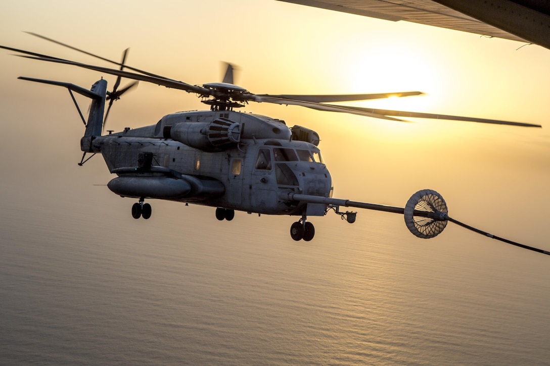 A CH-53E Super Stallion  from the 22nd Marine Expeditionary Unit soars across the Red Sea to rendezvous with a C-130 Hercules, organic to Special Purpose Marine Air-Ground Task Force-Crisis Response-Central Command, for air-to-air refueling operations July 30, 2016. VMGR-352 hosted aerial refuel training for multiple CH-53s demonstrating synergy between SPMAGTF-CR-CC and 22nd MEU.  SPMAGTF-CR-CC is currently forward deployed in several host nations, with the ability to respond to a variety of contingencies.