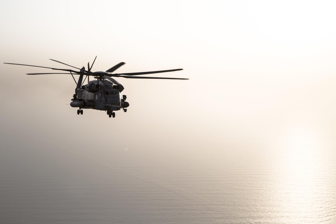 A CH-53E Super Stallion with the 22nd Marine Expeditionary Unit soars over the Red Sea to rendezvous with a Marine Aerial Refueler Squadron - 352 C-130 Hercules for air-to-air refueling, July 30, 2016. VMGR – 352 is currently a component of Special Purpose Marine Air-Ground Task Force-Crisis Response-Central Command forward deployed to the U.S. Central Command area of responsibility supporting a variety of missions.  VMGR-352 supported aerial refuel training for multiple 22nd MEU CH-53s demonstrating synergy between the two MAGTFs.