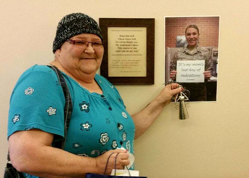 FOND DU LAC, Wis. – Senior Airman Rose Gudex, 21st Space Wing Public Affairs photojournalist, sent a photo to her mother’s cancer treatment center to be displayed on the day she finished radiation in Fond du Lac, Wis., Sept. 18, 2015. Even though Gudex couldn’t be there for physical support, she was there in spirit as her mom rang the bell to signify a major milestone. (Courtesy photo)