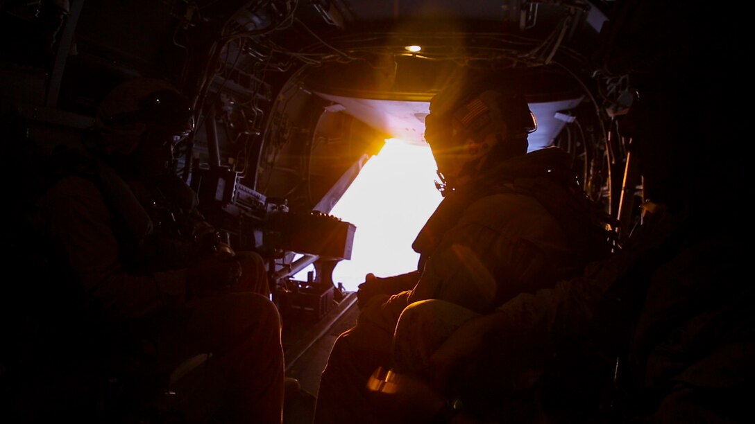 U.S. Marines with Marine Medium Tiltrotor Squadron-363, Special Purpose Marine Air-Ground Task Force-Crisis Response-Central Command, prepare for aerial gunnery training from an MV-22 Osprey above the Arabian Gulf, July 27, 2016. The squadron provides SPMAGTF-CR-CC with assault support, as well as transport of combat troops, supplies and equipment during expeditionary, joint or combined operations. SPMAGTF – CR – CC is a self-sustaining expeditionary unit, designed to provide a broad range of crisis response capabilities throughout the Central Command area of responsibility, using organic aviation, logistical, and ground combat assets, to include embassy reinforcement and tactical recovery of aircraft and personnel. (Photo by Cpl. Danielle Rodrigues)