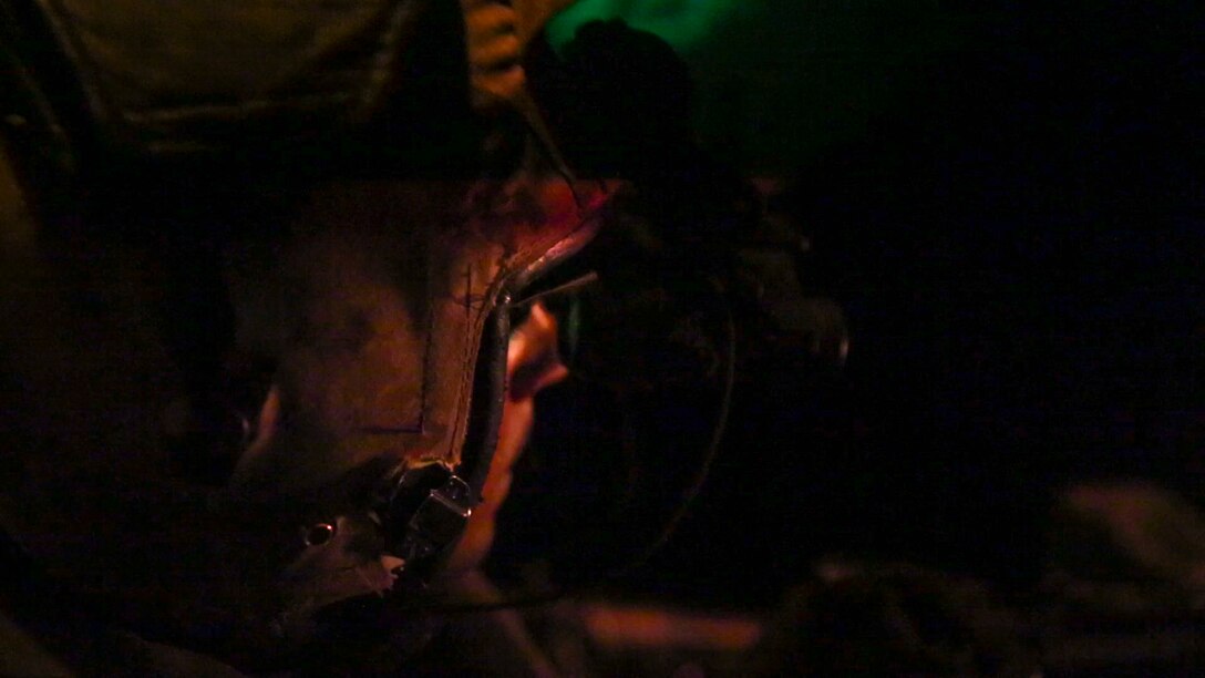 A U.S. Marine with Marine Medium Tiltrotor Squadron-363, Special Purpose Marine Air-Ground Task Force-Crisis Response-Central Command, fires a .50 caliber machine gun from the back of an MV-22 Osprey during aerial gunnery training over the Arabian Gulf, July 27, 2016. The squadron provides SPMAGTF-CR-CC with assault support, as well as transport of combat troops, supplies and equipment during expeditionary, joint or combined operations. SPMAGTF – CR – CC is a self-sustaining expeditionary unit, designed to provide a broad range of crisis response capabilities throughout the Central Command area of responsibility, using organic aviation, logistical, and ground combat assets, to include embassy reinforcement and tactical recovery of aircraft and personnel. (Photo by Cpl. Danielle Rodrigues)