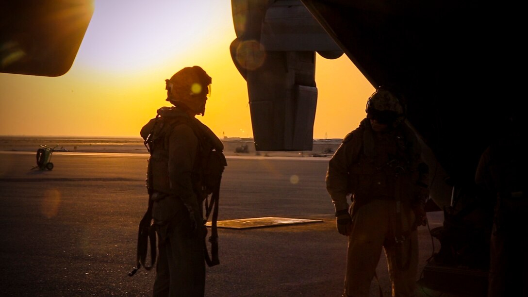 U.S. Marines with Marine Medium Tiltrotor Squadron-363, Special Purpose Marine Air-Ground Task Force-Crisis Response-Central Command, prepare to board an MV-22 Osprey in order to conduct aerial gunnery training over the Arabian Gulf, July 27, 2016. The squadron provides SPMAGTF-CR-CC with assault support, as well as transport of combat troops, supplies and equipment during expeditionary, joint or combined operations. SPMAGTF – CR – CC is a self-sustaining expeditionary unit, designed to provide a broad range of crisis response capabilities throughout the Central Command area of responsibility, using organic aviation, logistical, and ground combat assets, to include embassy reinforcement and tactical recovery of aircraft and personnel. (Photo by Cpl. Danielle Rodrigues)