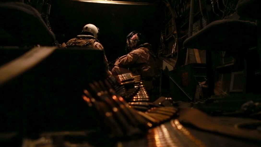 U.S. Marines with Marine Medium Tiltrotor Squadron-363, Special Purpose Marine Air-Ground Task Force-Crisis Response-Central Command, prepare ammunition to fire during aerial gunnery training over the Arabian Gulf, July 27, 2016. The squadron provides SPMAGTF-CR-CC with assault support, as well as transport of combat troops, supplies and equipment during expeditionary, joint or combined operations. SPMAGTF – CR – CC is a self-sustaining expeditionary unit, designed to provide a broad range of crisis response capabilities throughout the Central Command area of responsibility, using organic aviation, logistical, and ground combat assets, to include embassy reinforcement and tactical recovery of aircraft and personnel. (Photo by Cpl. Danielle Rodrigues)