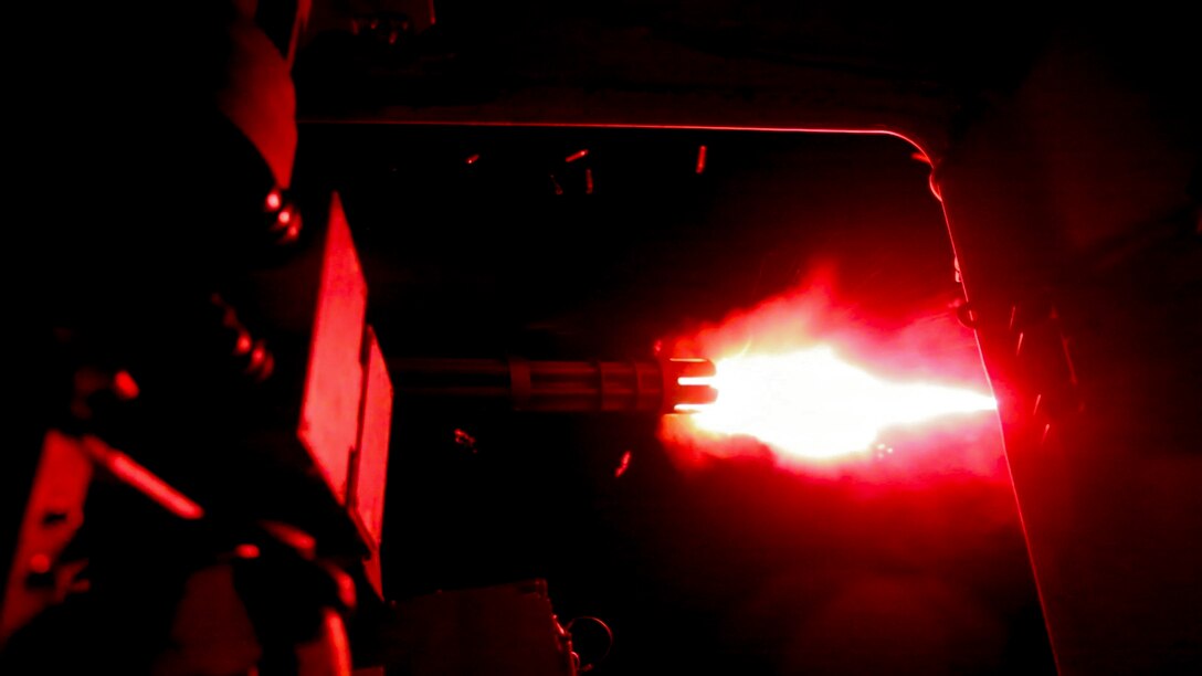 A U.S. Marine with Marine Medium Tiltrotor Squadron-363, Special Purpose Marine Air-Ground Task Force-Crisis Response-Central Command, fires an MV-22 Osprey’s belly-mounted defense weapon system during aerial gunnery training over the Arabian Gulf, July 27, 2016. The DWS is a remote-controlled 7.62 millimeter mini-gun capable of rotating 360 degrees, firing 3,000 rounds per minute and providing fire suppression effective up to 1,500 meters. The squadron provides SPMAGTF-CR-CC with assault support, as well as transport of combat troops, supplies and equipment during expeditionary, joint or combined operations. SPMAGTF – CR – CC is a self-sustaining expeditionary unit, designed to provide a broad range of crisis response capabilities throughout the Central Command area of responsibility, using organic aviation, logistical, and ground combat assets, to include embassy reinforcement and tactical recovery of aircraft and personnel. (Photo by Cpl. Danielle Rodrigues)