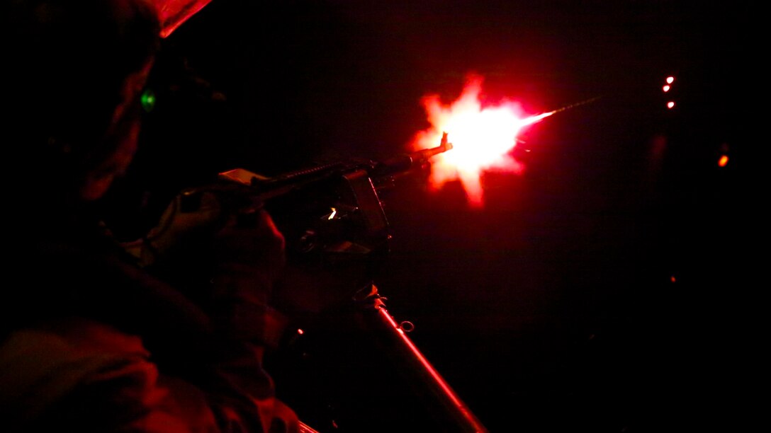 A U.S. Marine with Marine Medium Tiltrotor Squadron-363, Special Purpose Marine Air-Ground Task Force-Crisis Response-Central Command, fires an MV-22 Osprey’s belly-mounted defense weapon system during aerial gunnery training over the Arabian Gulf, July 27, 2016. The DWS is a remote-controlled 7.62 millimeter mini-gun capable of rotating 360 degrees, firing 3,000 rounds per minute and providing fire suppression effective up to 1,500 meters. The squadron provides SPMAGTF-CR-CC with assault support, as well as transport of combat troops, supplies and equipment during expeditionary, joint or combined operations. SPMAGTF – CR – CC is a self-sustaining expeditionary unit, designed to provide a broad range of crisis response capabilities throughout the Central Command area of responsibility, using organic aviation, logistical, and ground combat assets, to include embassy reinforcement and tactical recovery of aircraft and personnel. (Photo by Cpl. Danielle Rodrigues)