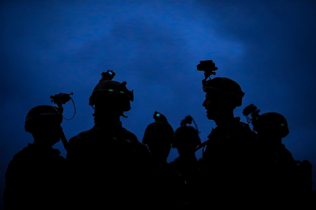 U.S. Marine Corps infantry squad leaders assigned to School of Infantry West, Detachment Hawaii, prepare to head out for a night ambush scenario during the Advanced Infantry Course (AIC) at the Kaneohe Bay Range aboard Marine Corps Base Hawaii, Aug. 30, 2016. AIC is intermediate training designed to enhance and test the Marine's skills and leadership abilities as squad leaders in a rifle platoon. 